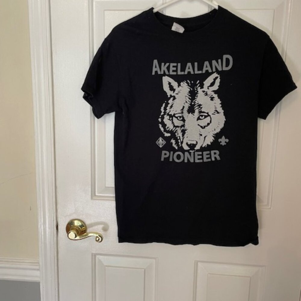 Black t-shirt with Akelaland Pioneer wolf design, cotton, size small